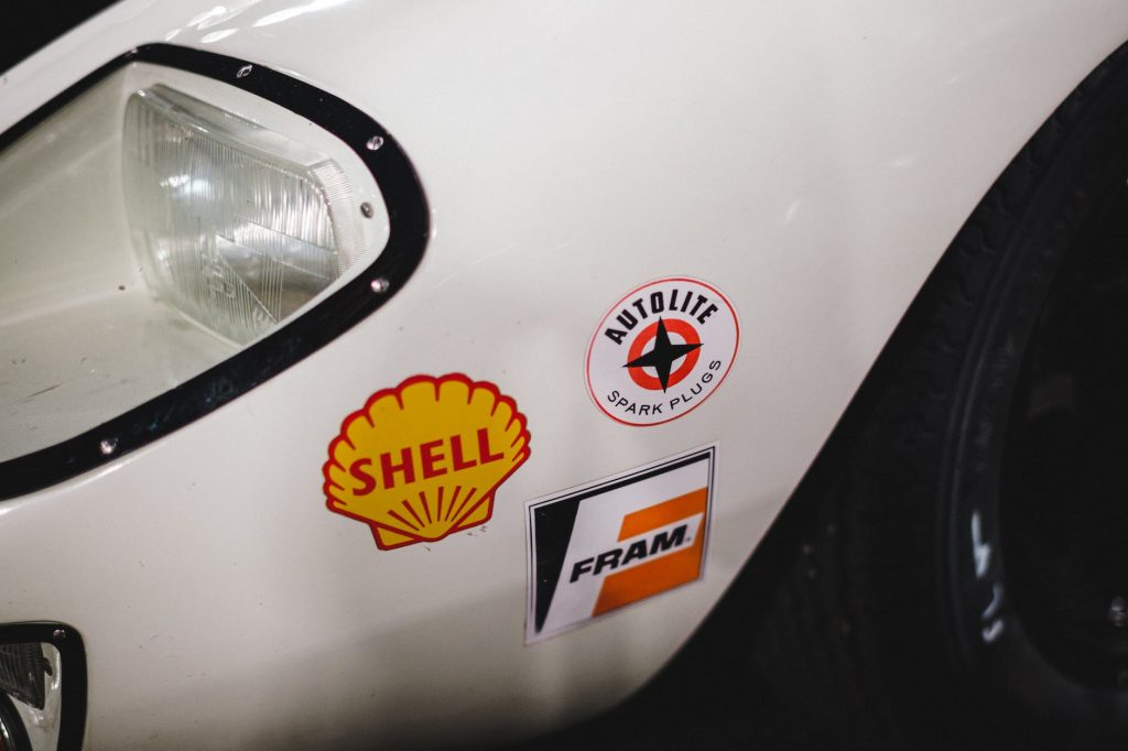 close up of logos on a car by logo API